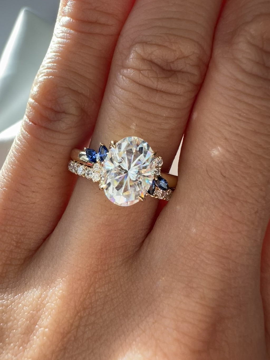 Paired with our classic moissanite pave eternity band